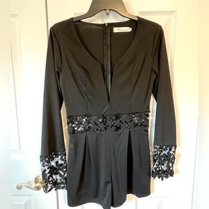 City Boutique black romper with flower design size M